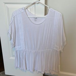 Oversized white blouse with details